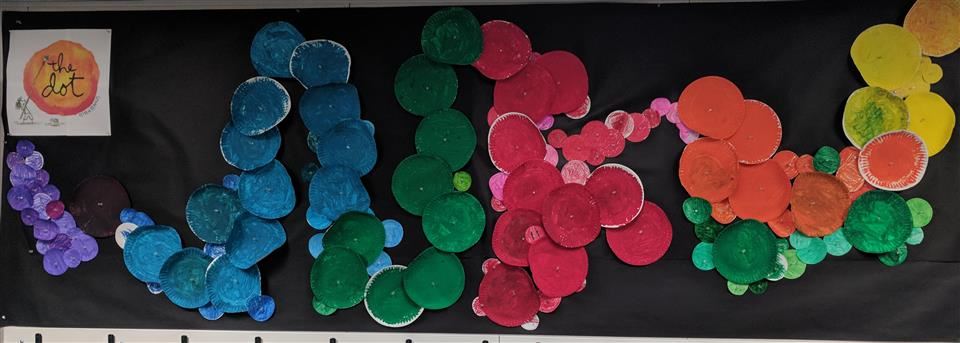 Colored dots on black background